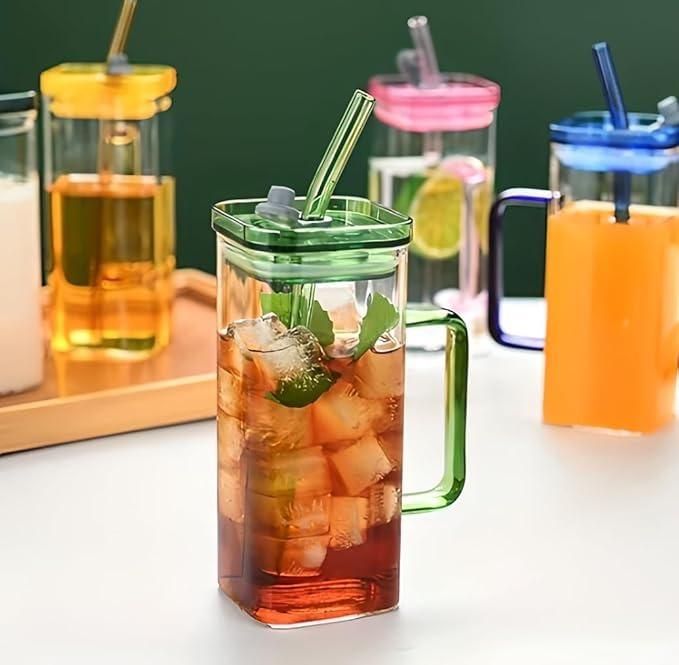 THE GIR FARMER green handled glass tumbler for boba tea with lid and straw filled with iced tea and lime