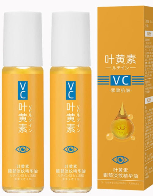 The Gir Farmer anti-aging eye treatment oil in two small orange bottles with white caps and matching orange box