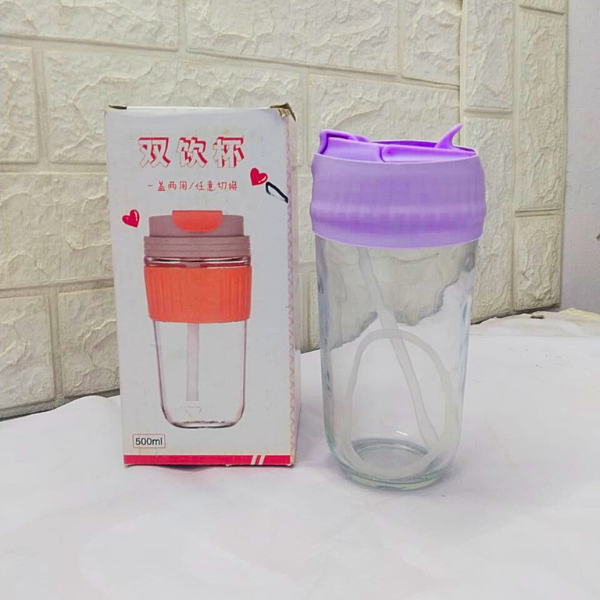 500ml glass drink cup with purple silicone lid and straw by Amd-Deodap next to its packaging box