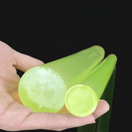 Close-up of high elastic PU shock absorbing rods in neon green held in hand by THE GIR FARMER
