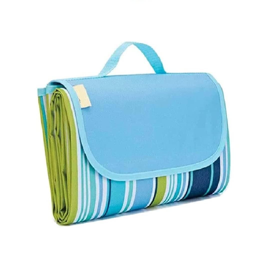 Foldable and lightweight washable picnic mat in blue and green stripes with a carrying handle