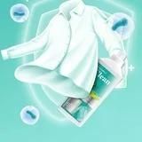 The Gir Farmer gentle stain remover for clothes with a clean white shirt in background