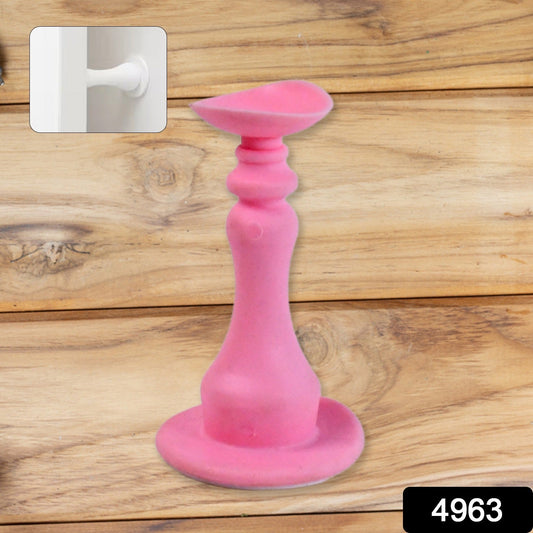 Pink washing machine door holder designed to keep doors open during wash cycles