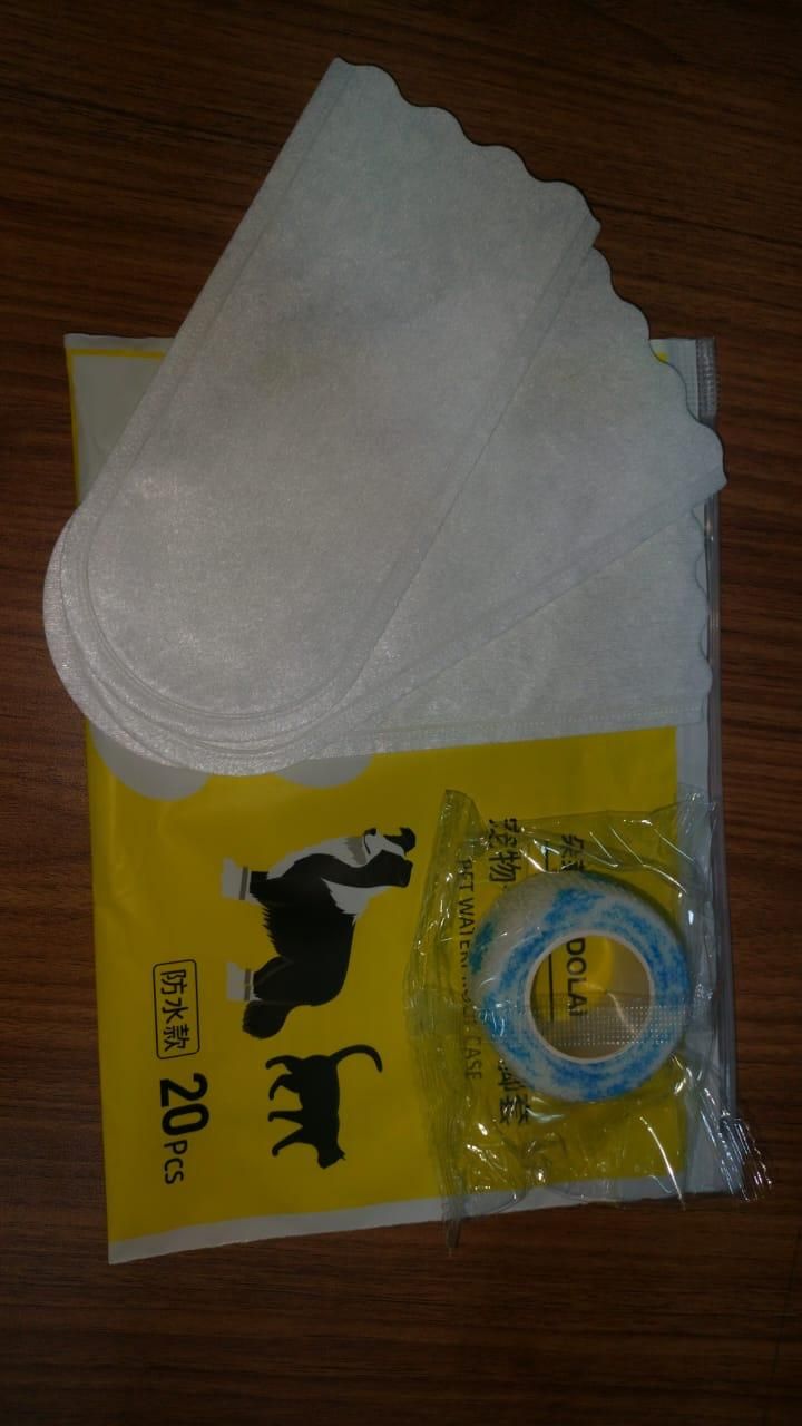 THE GIR FARMER waterproof dog paw covers with 20 pieces white protective pads and blue adhesive tape on packaging