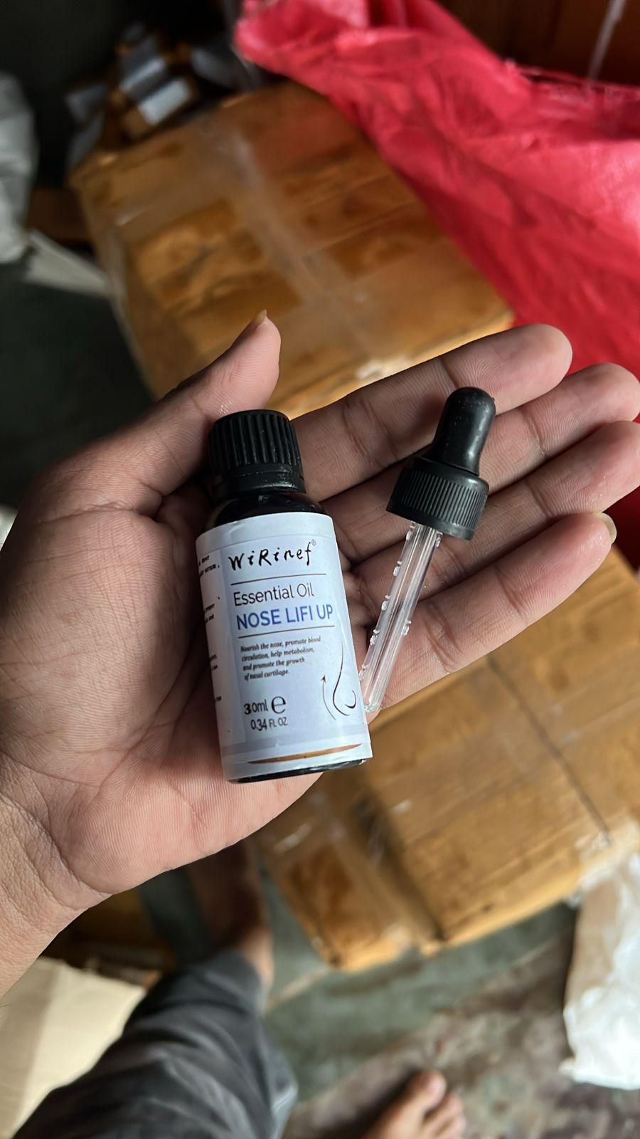 Essential Nose Lifting Oil in a dropper bottle for enhancing nose contour and shape