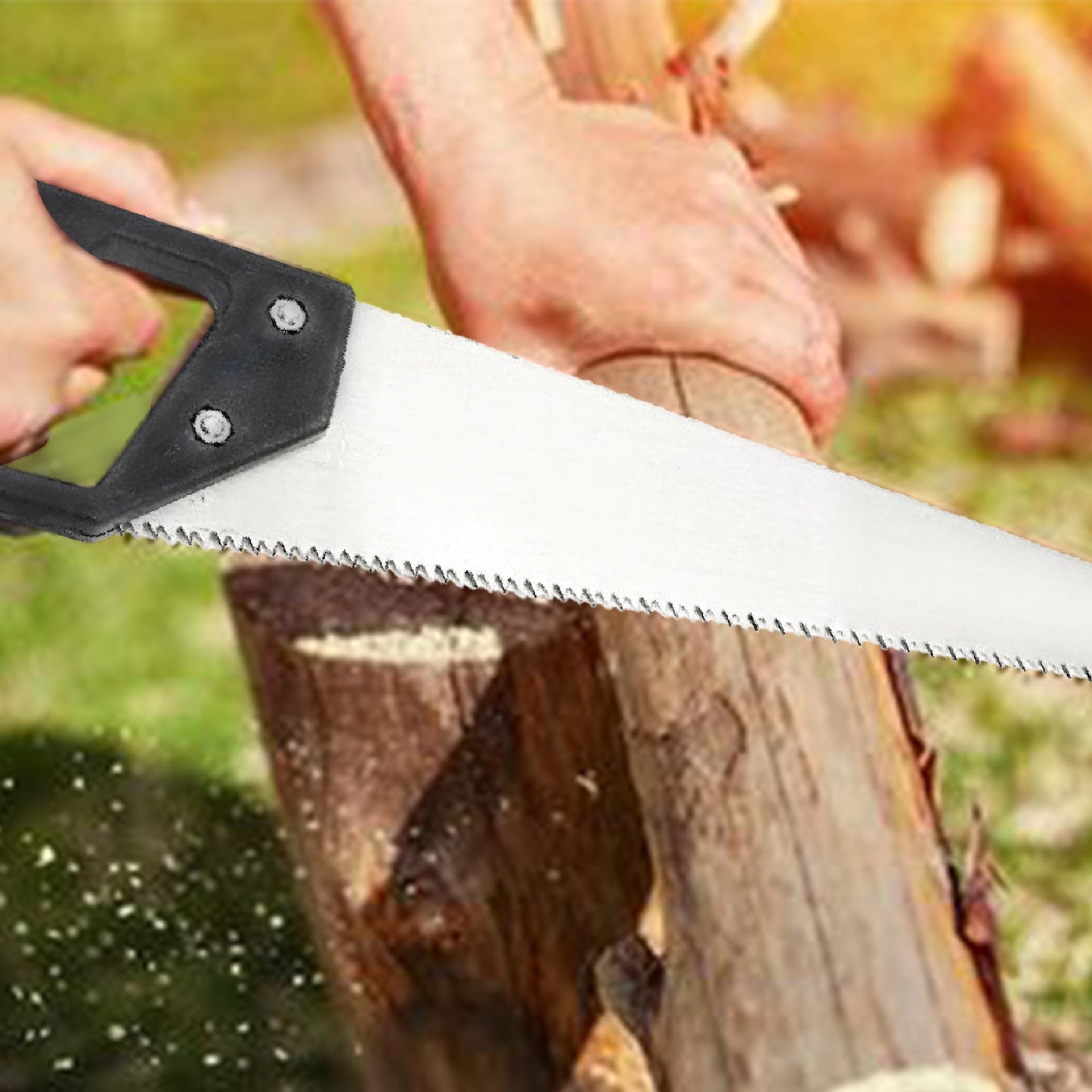Your Brand powerful hand saw for wood cutting with black handle sawing a log outdoors producing wood chips
