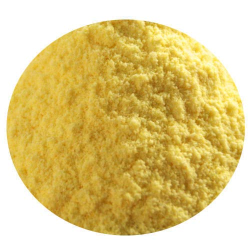 Organic corn flour from THE GIR FARMER with a fine, yellow texture for baking and cooking