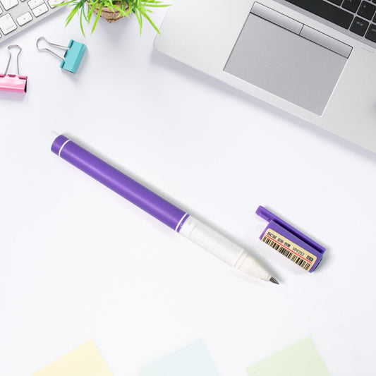 0.5 mm black ball pen on a workspace with stationery and a laptop