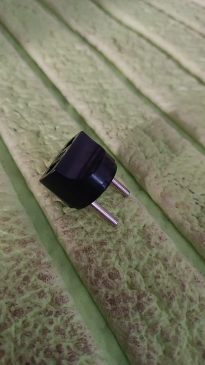 Compact 2 pin plug adapter for international power compatibility and travel convenience