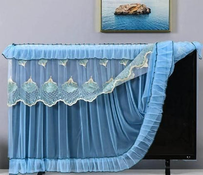 Elegant blue 28-32 inch TV dustproof cover with lace detailing and ruffled design