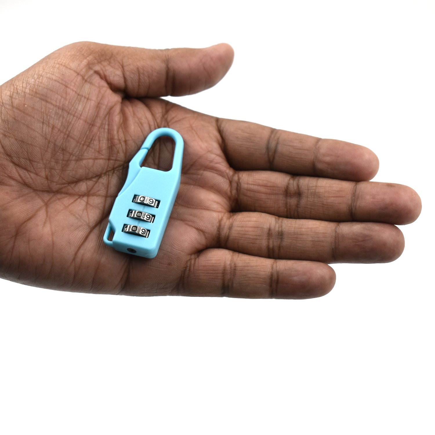 Hand holding a light blue 3 digit luggage lock for secure travel and easy code setting