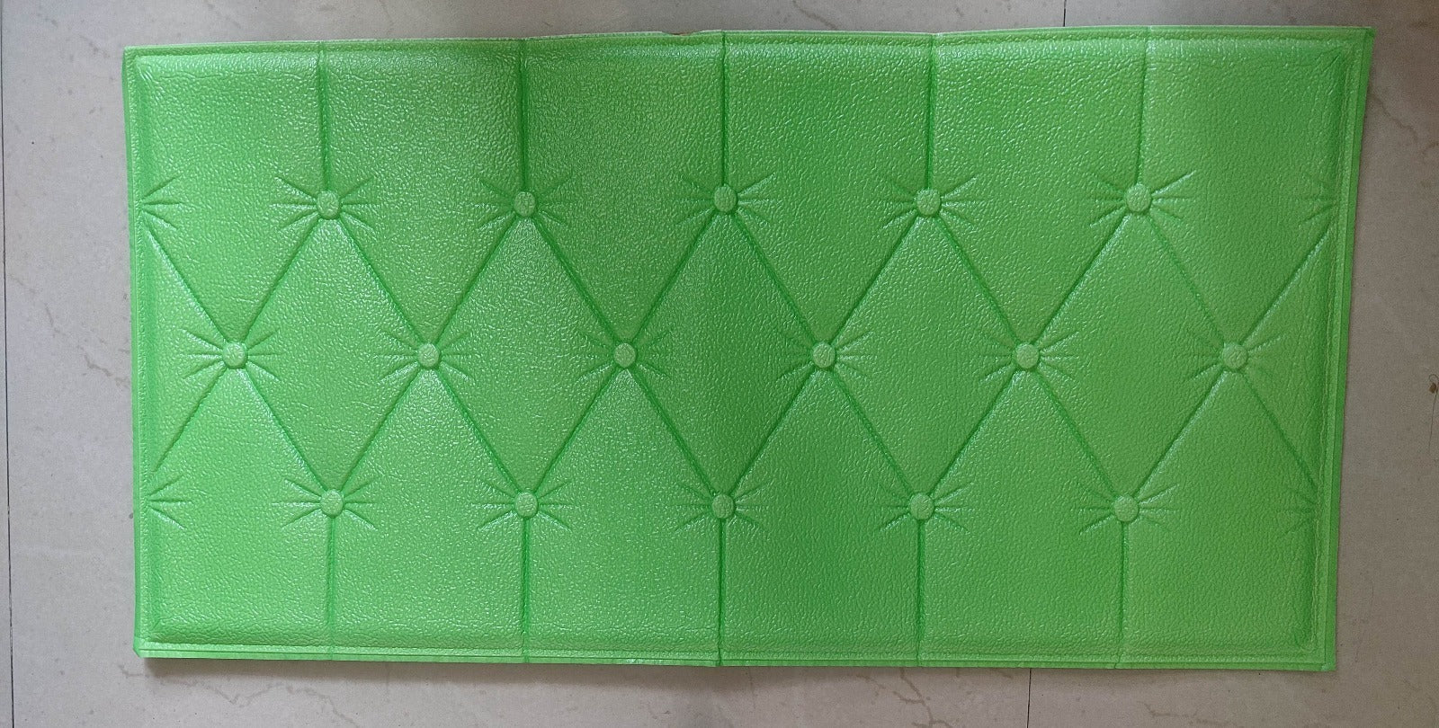 Bright green 3D adhesive wallpaper with tufted design for home improvement projects