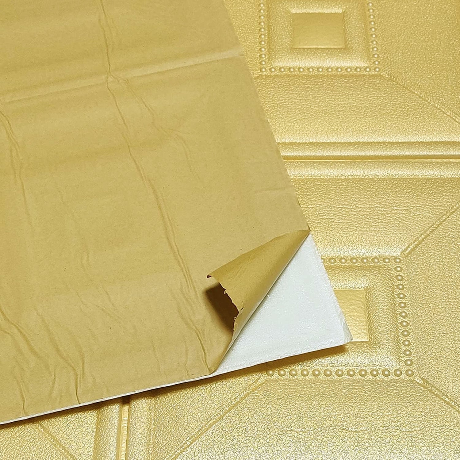 Peel and stick 3D foam wallpaper panels in gold color for easy home decoration