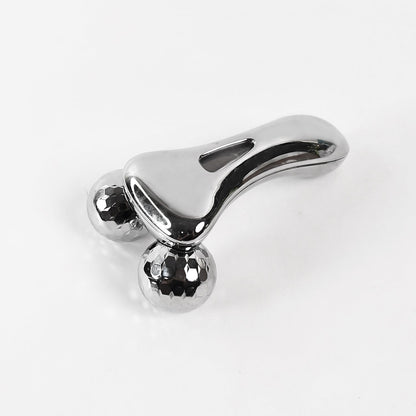 3D roller face and body massager in sleek silver design for enhancing circulation and relaxation