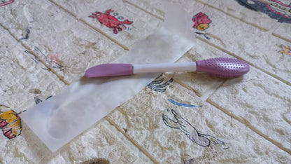 Double-headed silicone mask brush for applying skincare products evenly and efficiently