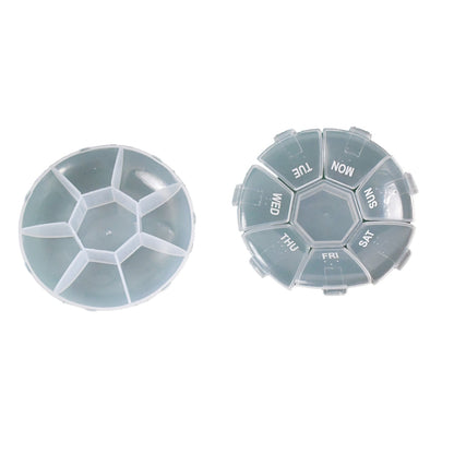 Transparent 7 day pill organizer with individual compartments for each day of the week