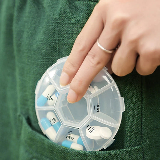 Compact 7 day pill organizer with easy-to-open compartments for daily medication management