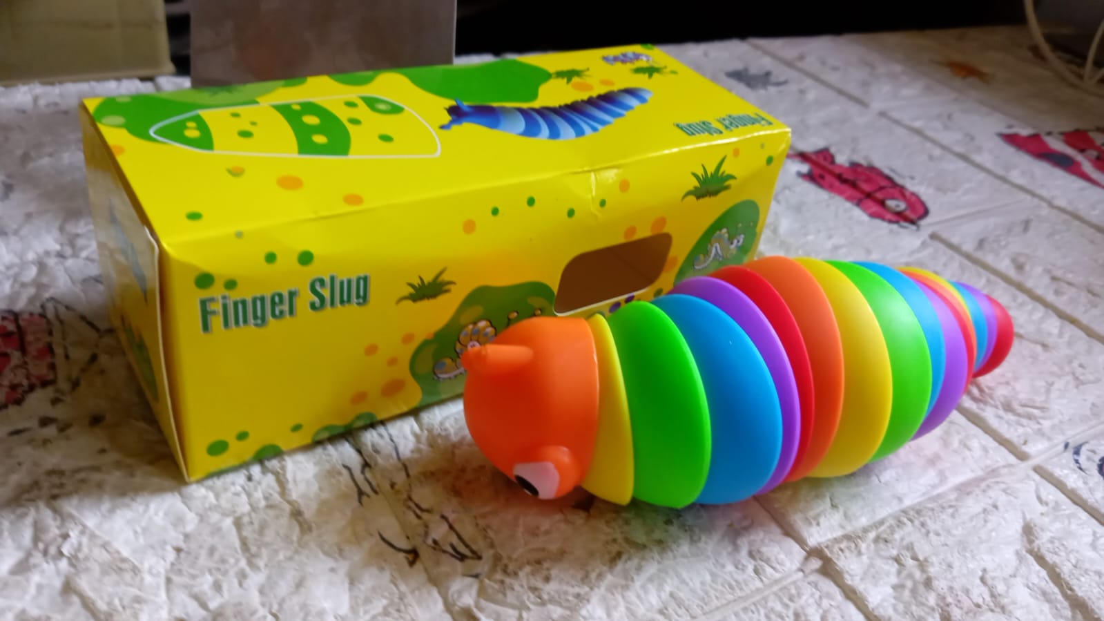 3D Rainbow Color Plastic Slug Fidget Toys, Stress Relieving Toy, Sensory Slug Toy for Boys and Girls, Finger slug Toy, for Autistic, Caterpillar Fidget Toys Stress Relief Gifts for Toddlers Kids Adults  (1 Pc) Your Brand