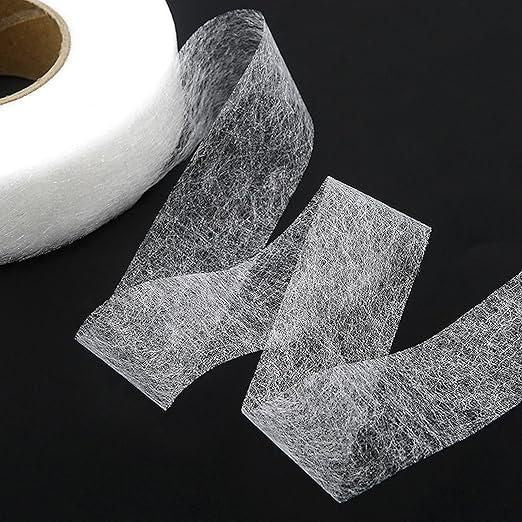 Transparent adhesive fabric fusion tape roll and cut pieces for seamless fabric joining
