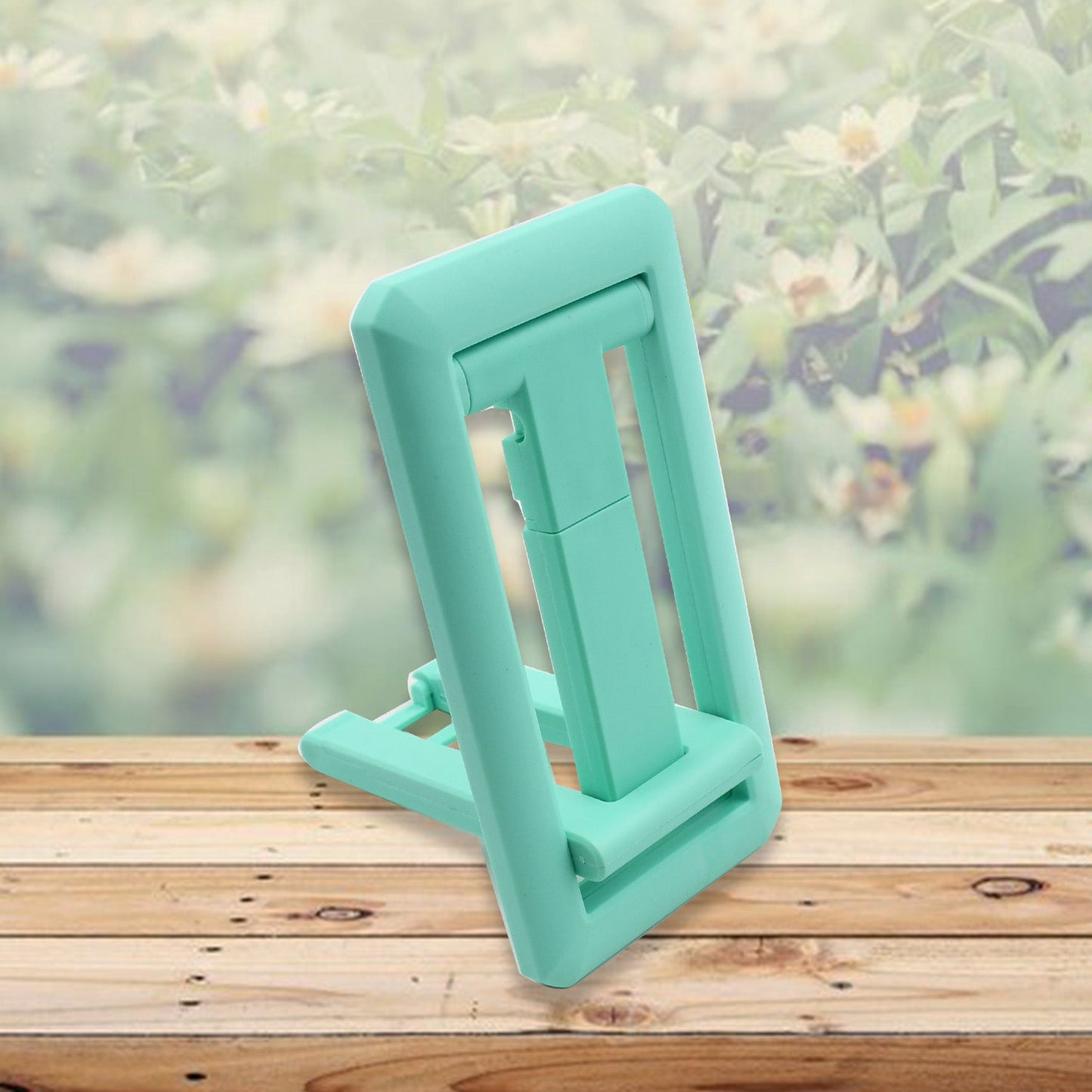 Adjustable foldable mobile stand in mint green, perfect for hands-free viewing and stable support.