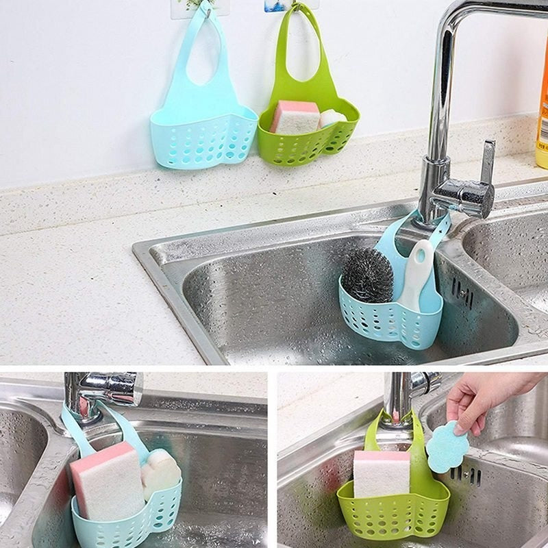 Adjustable sink caddy basket in blue and green for organizing sponges and cleaning supplies by the sink