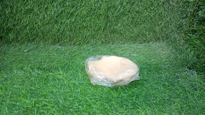 Your Brand anti crack silicone heel protectors packaged on a green grass background