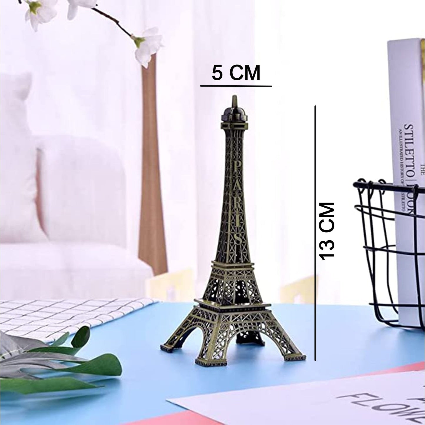 Antique Eiffel Tower statue in bronze finish, measuring 5 cm by 13 cm, perfect for home decor