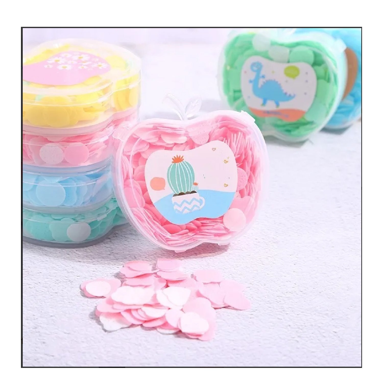 Apple scented paper soap in colorful packs, perfect for travel and personal care.