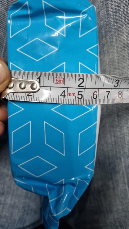 Artistic hand face vase for home decor with a blue geometric pattern and measuring tape for size reference