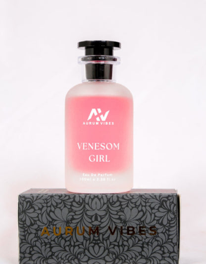 The Gir Farmer long-lasting floral perfume 100ml bottle with pink gradient and black cap on patterned box
