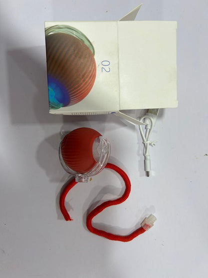 THE GIR FARMER automatic rolling ball for cats with red flexible tail and white USB charging cable