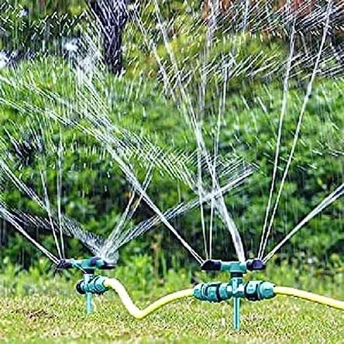 THE GIR FARMER automatic rotating yard sprinkler watering lush green lawn and plants efficiently