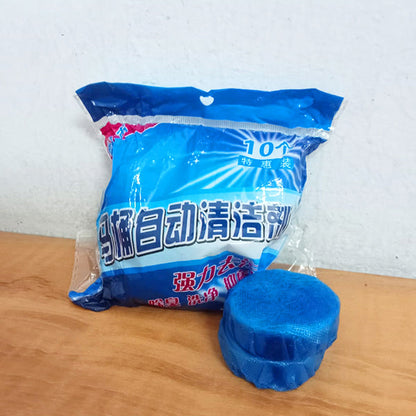 Amd-Deodap blue automatic toilet bowl cleaner tablets package with one tablet on wooden surface