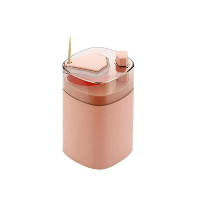 Automatic toothpick dispenser in pink color for easy access and storage of toothpicks