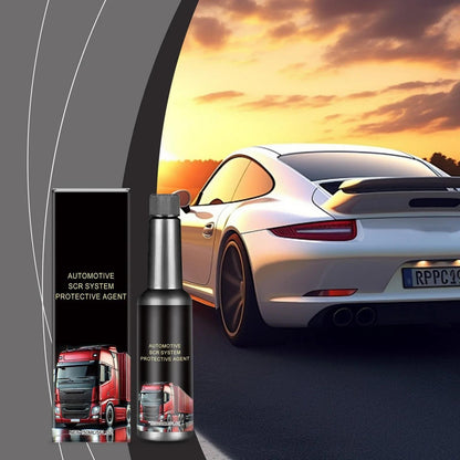 Automotive SCR system protective agent bottle beside a truck and a car in a sunset setting