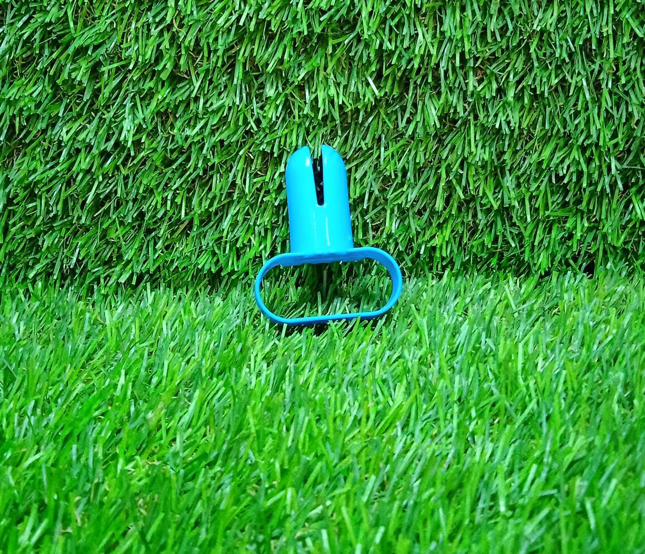 Your Brand balloon tying tool in blue, perfect for easily tying balloons for home improvement projects