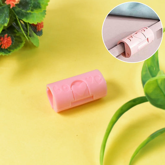 Pink bed sheet clips designed to secure sheets and prevent slipping for a neat bed setup