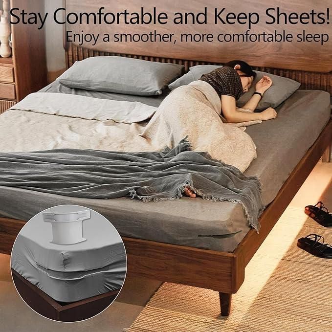 Bed sheet grippers for corners securing fitted sheets on a wooden bed with a person sleeping comfortably
