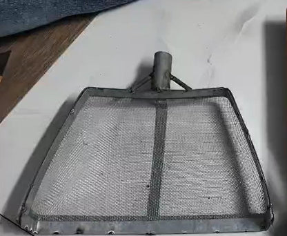 Durable metal soil lifting tool with mesh design, ideal as the best shovel for soil lifting