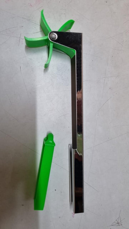 The Gir Farmer green and stainless steel tool designed as the best tool for slicing watermelon easily