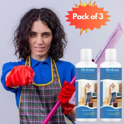 Pack of 3 Blesta organic fabric stain remover bottles with woman cleaning wearing red gloves and plaid apron
