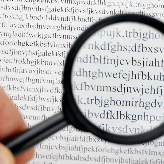 Breakage-proof magnifying glass for reading, enhancing text clarity with enlarged view