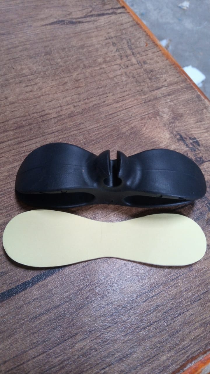 Your Brand appliance cable organizer in black with an adhesive backing for neat cable management