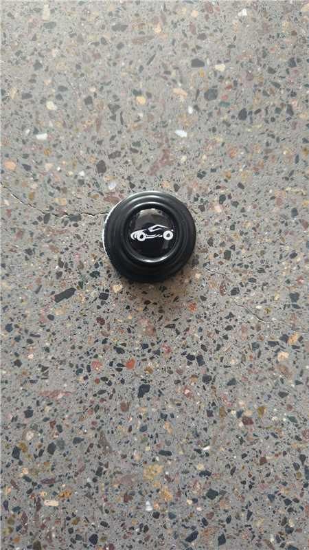Car shock absorber bumper protector in black designed for vehicle durability and impact resistance