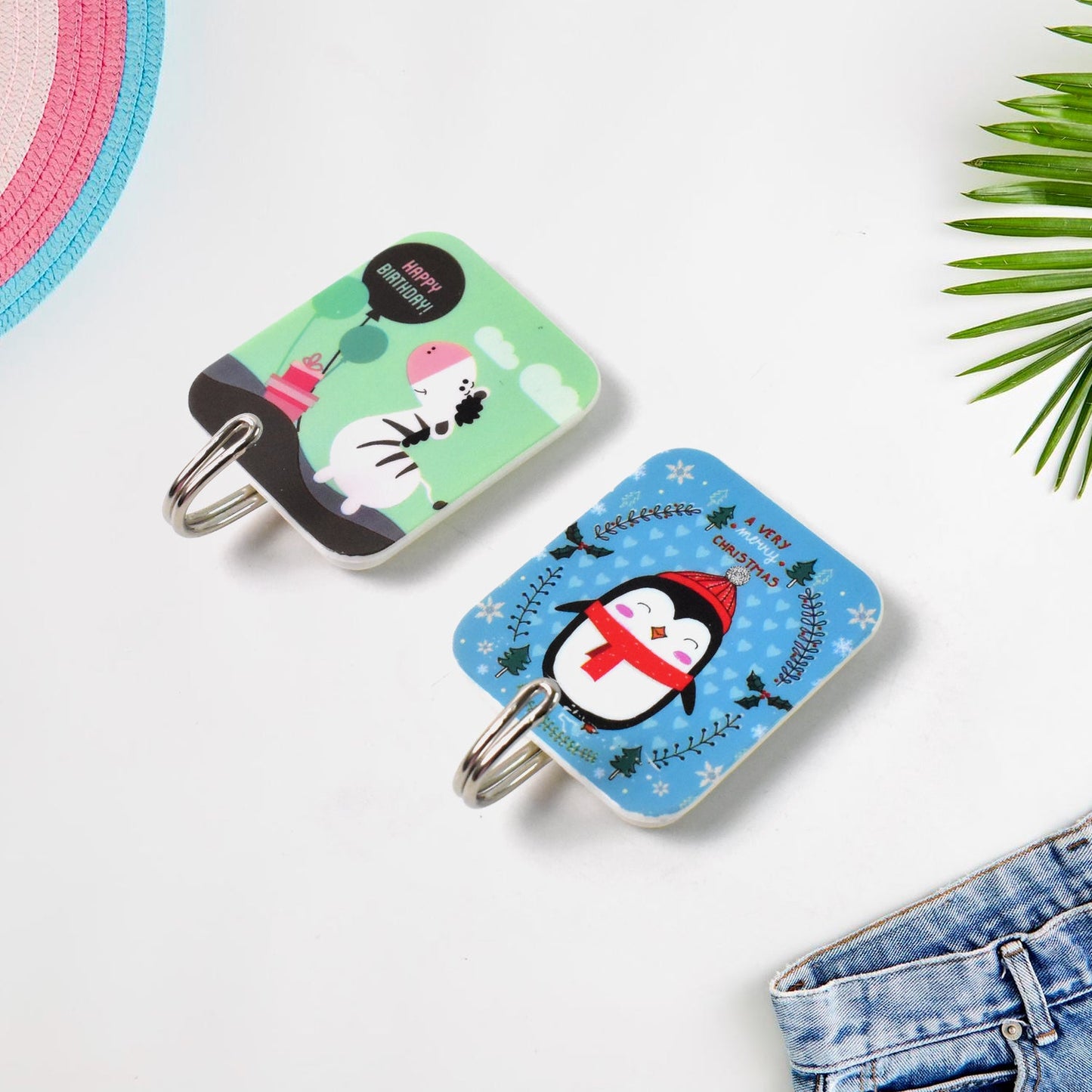 Cute cartoon self-adhesive hooks featuring penguin and sheep designs for easy home organization