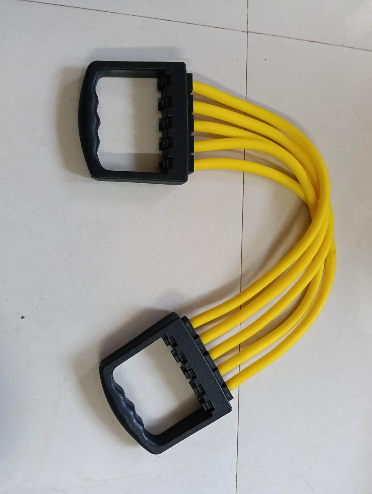Chest expander resistance bands with sturdy handles for strength training and fitness exercises