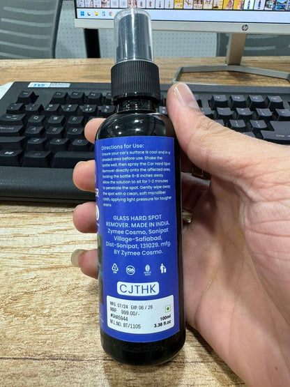 Car glass stain cleaner spray bottle with clear label and ergonomic design for easy cleaning