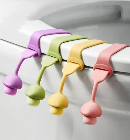 Set of colorful hygienic toilet lid lifter hooks hanging on a white toilet seat edge