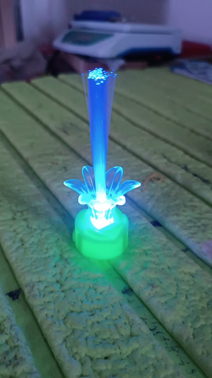 Colorful LED Diwali candle with glowing flower design perfect for festive home decoration
