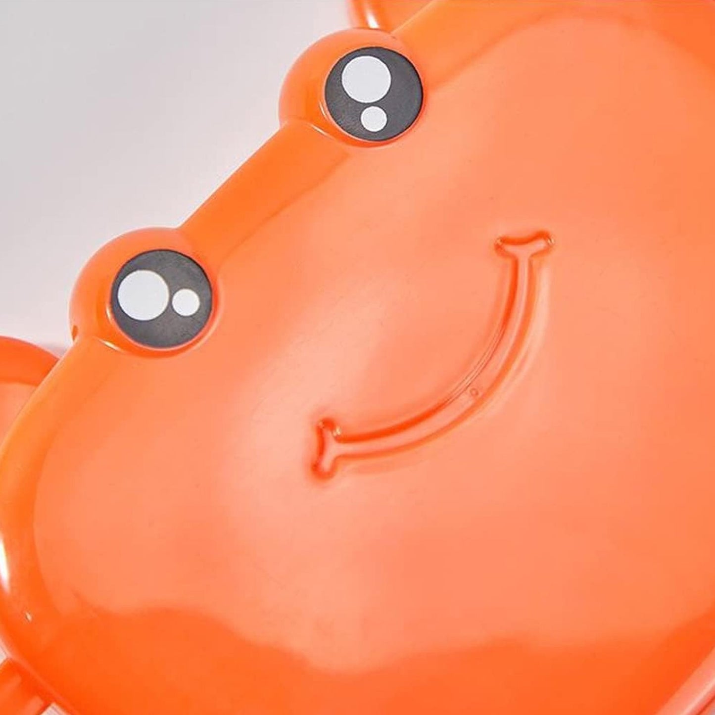 Fun crab ice mold for kids in bright orange color, perfect for creating playful ice shapes